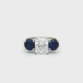 Radiant Cut Ring with Two Brilliant Side Stones and Sapphire Centre Stone