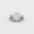 Oval Cut Ring with Marquise Side Stones and Seven Stone Curved Band