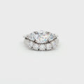 Three Stone Ring with Trillion Side Stones and Five Stone Curved Band
