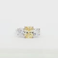 Radiant Cut Ring with Two Brilliant Side Stones and yellow Centre Stone
