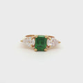Emerald Cut Three Stone Ring with Pear Side Stones in Yellow Gold
