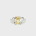 Radiant and Trillion Cut Ring with Yellow Stone