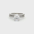 Oval Cut Soliatire Ring with Pave Setting and Matching Band