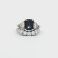 Radiant Cut Sapphire  Ring with Two Trillion Side Stones and Five Stone Curved Band