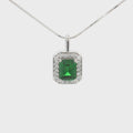 The Emerald Cut Halo Pendant with Emerald