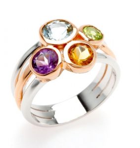 beautiful ring featuring 4 multi-coloured semi-precious stones including amethyst, citrine, blue topaz, peridot