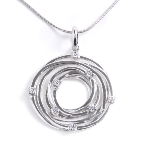 modern circular silver pendant with small diamond simulants