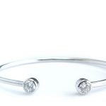 Cuff bangle with 1 carat (5.25mm) Diamond simulant in bezel set, thickness 2-3mm, inner diameter 60 mm in silver